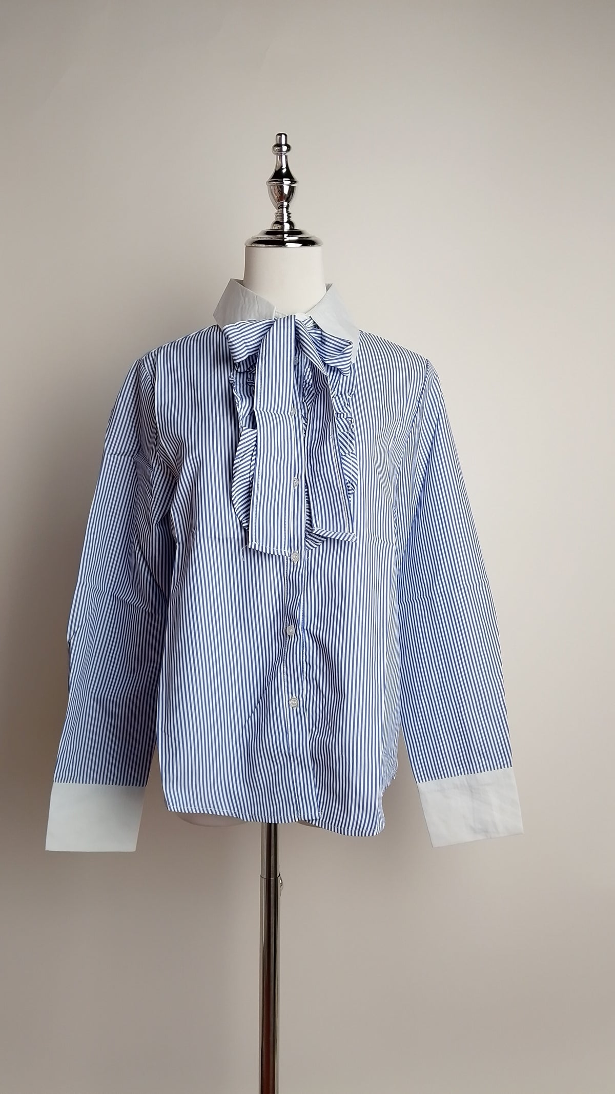 Blusa celeste con lazo / ANB26002