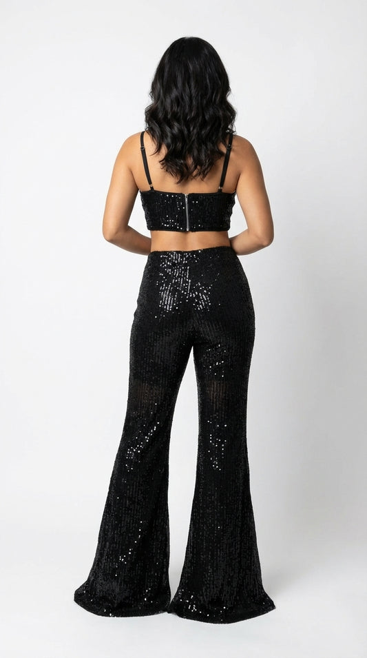 Enterizo negro glam con escote profundo / UV2