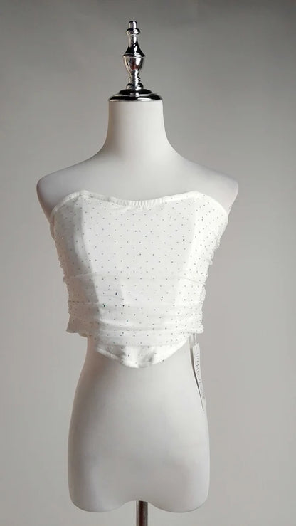 Top Strapless con Pedrería marca D&M + Falda de flecos negros de fiesta D&M /OUTEV109