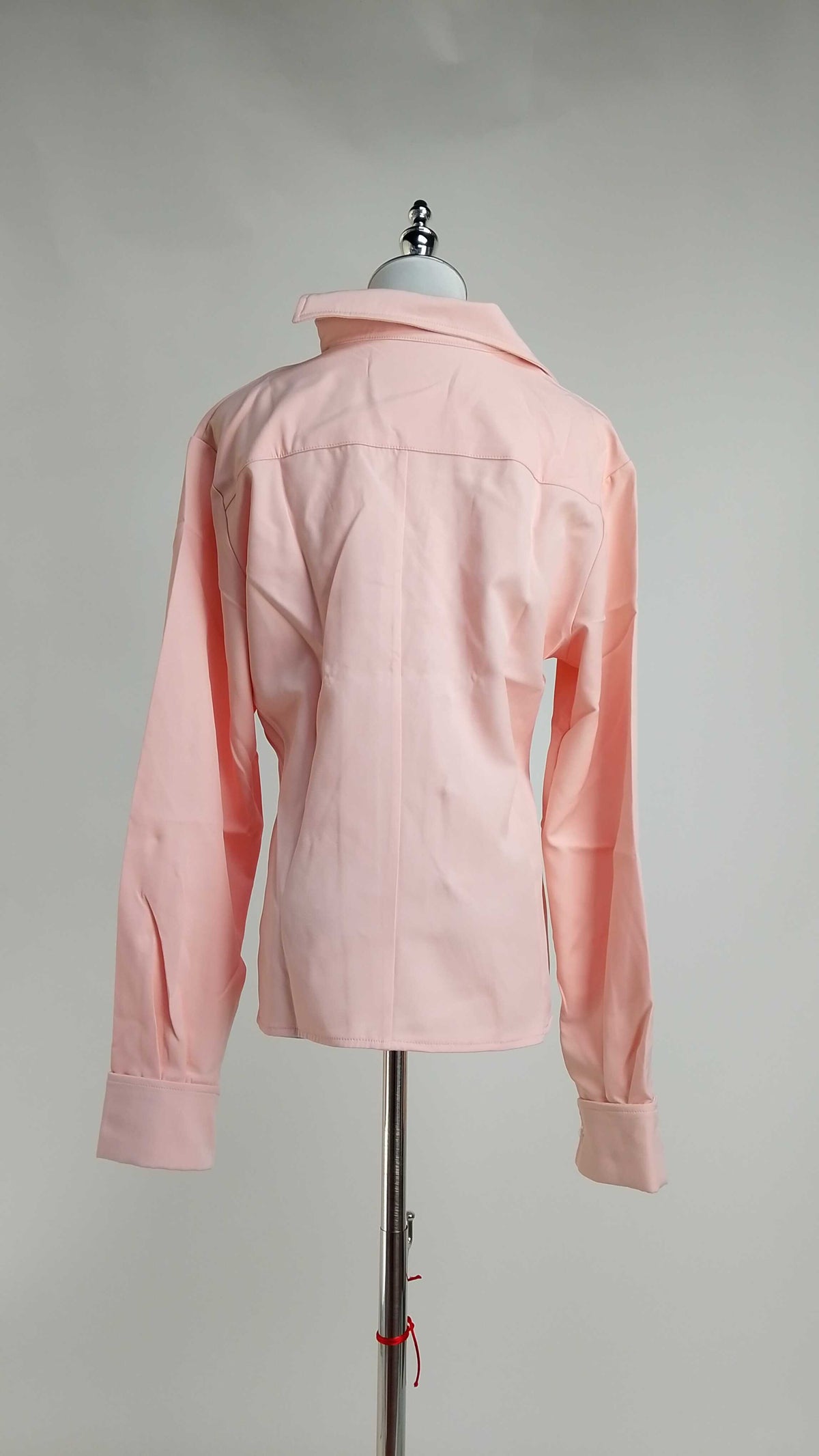 Blusa rosa pastel con volantes decorativos / AO129