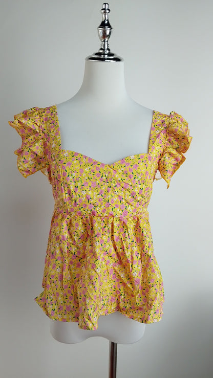 Blusa floral en tonos pastel con mangas cortas SH42 Betzy