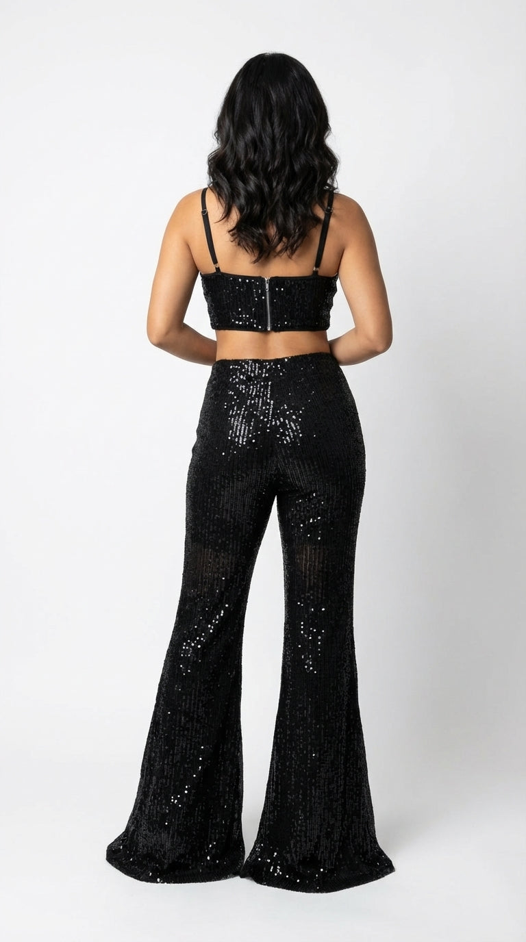 Enterizo negro glam con escote profundo / UV2