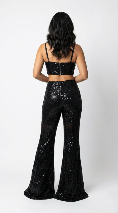 Enterizo negro glam con escote profundo / UV2