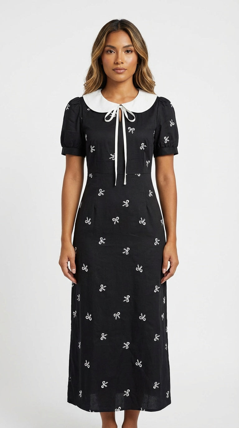 Vestido negro midi estampado / L15A