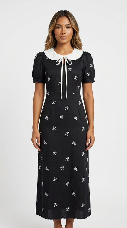 Vestido negro midi estampado / L15A